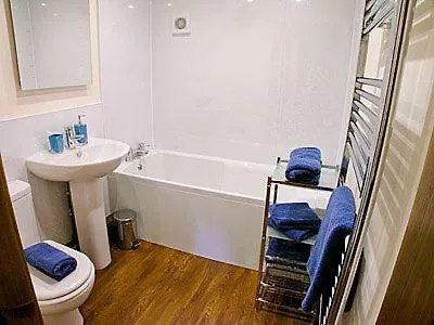 Апартаменты Coach House *